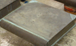 Aluminum books coated with bronze and green patina