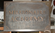 Sign foam with primer and bronze metal coat with rain streaked patina